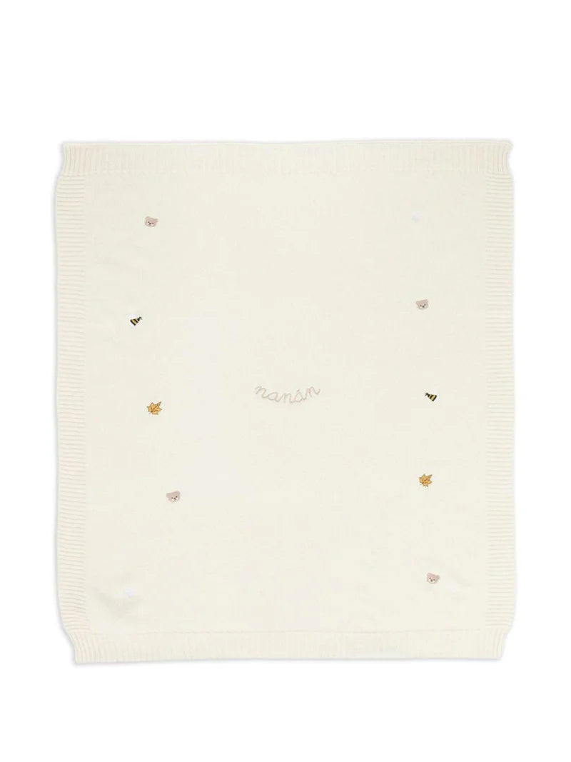 Coperta bianca in lana con ricami
