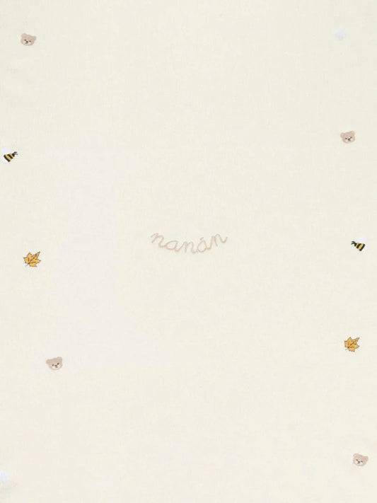 Coperta bianca in lana con ricami