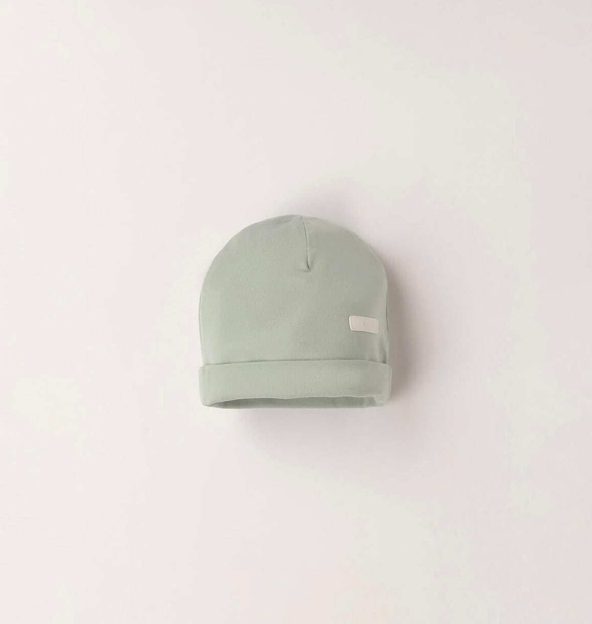 Cappellino neonato in cotone nel colore verde