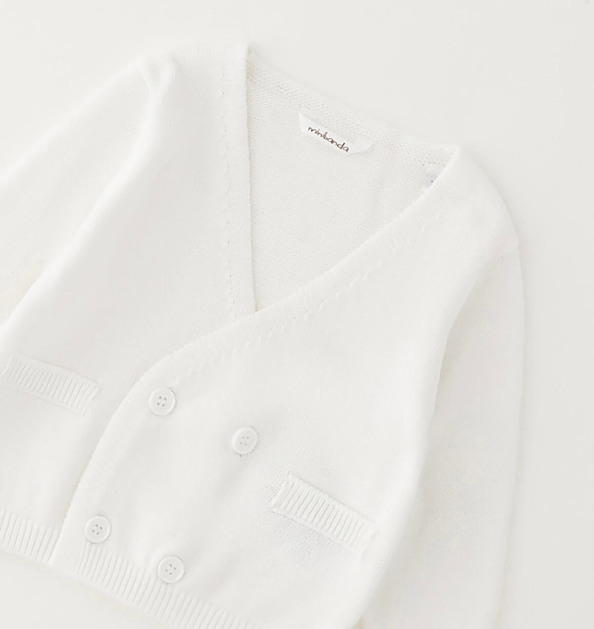 Cardigan per neonato in cotone con finte tasche