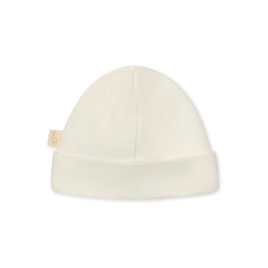 Cappellino in cotone bianco con fiocchetto a fantasia