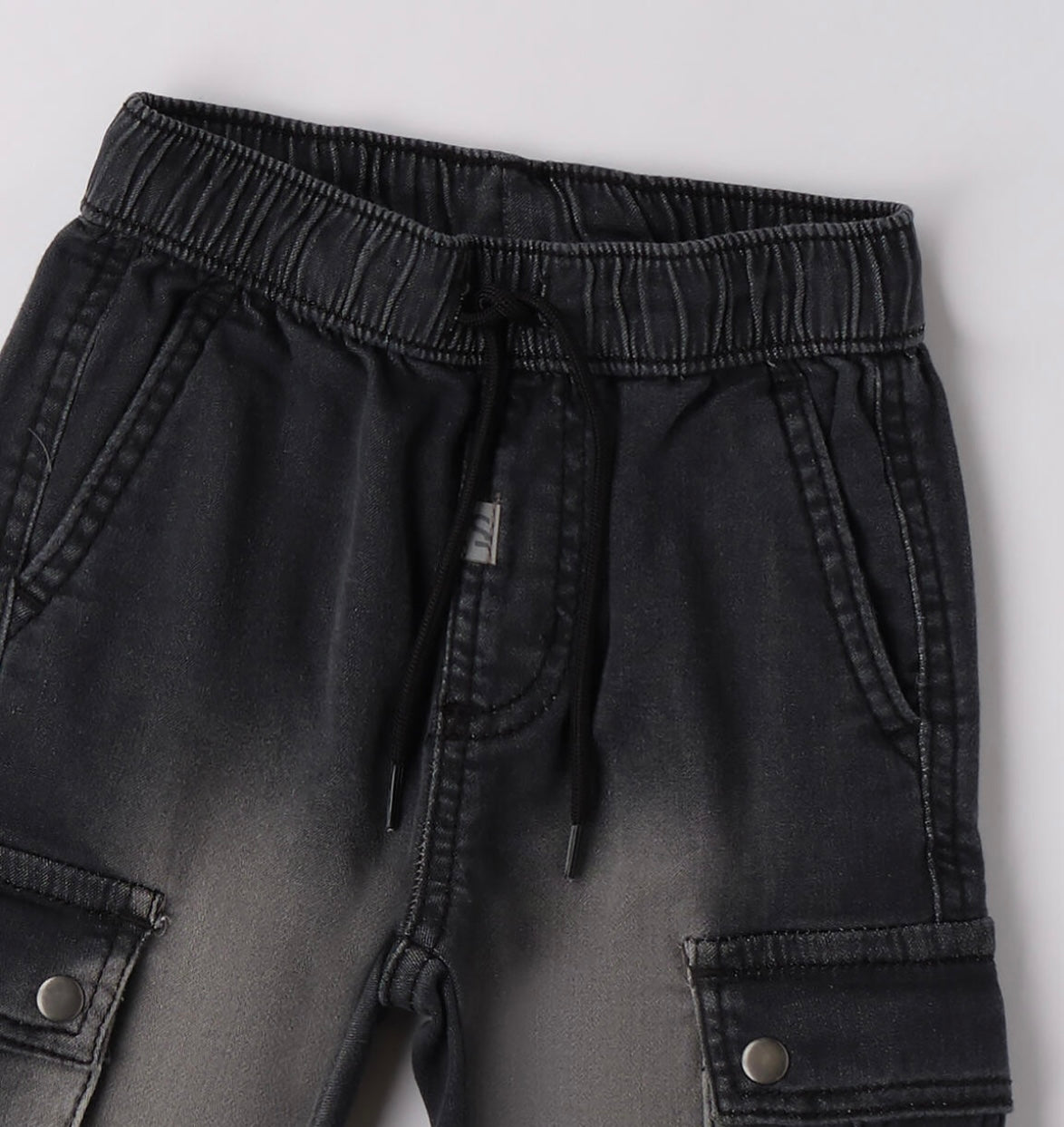 Jeans bambino con tasche laterali e coulisse