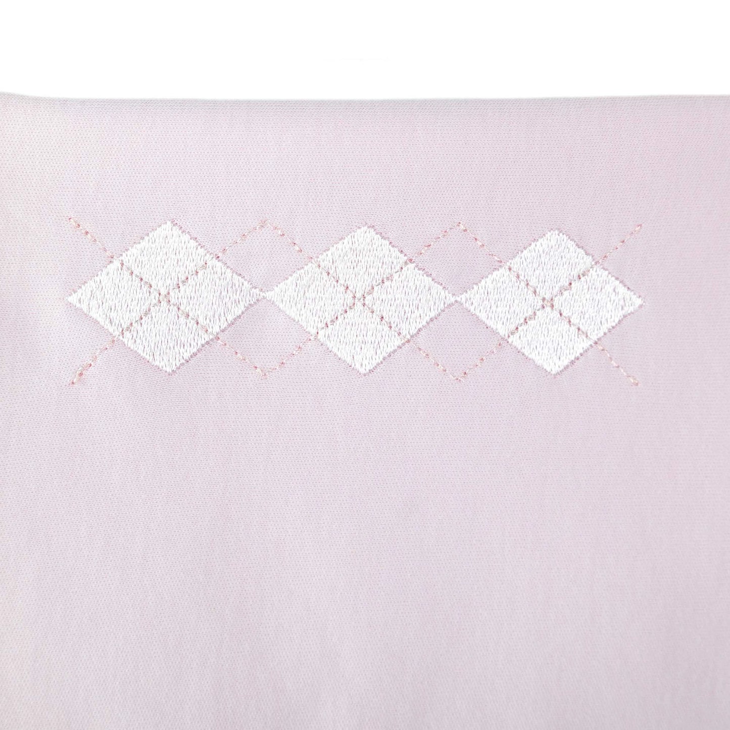 Quadrato in cotone rosa con ricamo rombi bianco