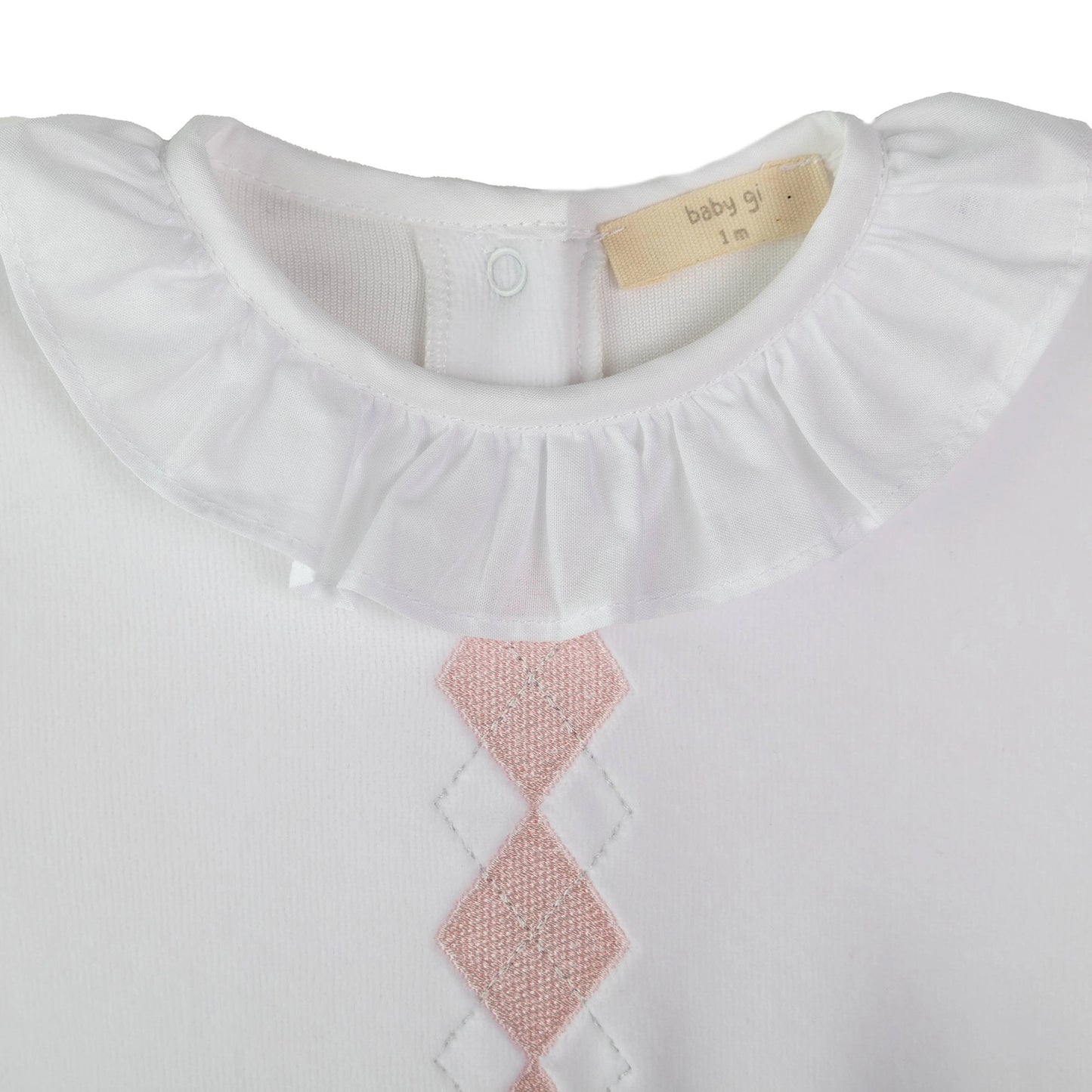 Tutina Preppy in ciniglia bianca con ricamo rombi rosa