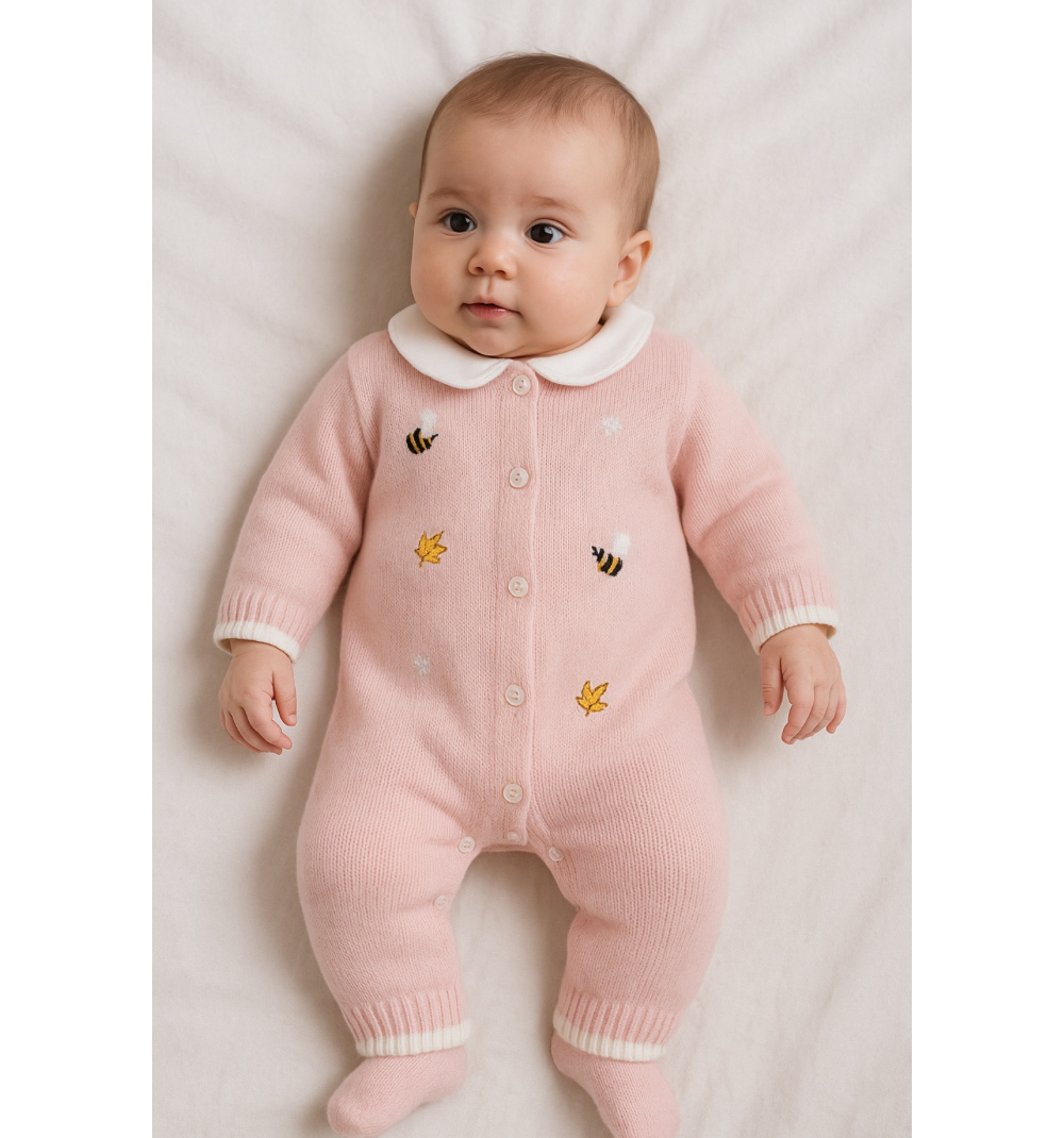 Tutina rosa in lana con ricami