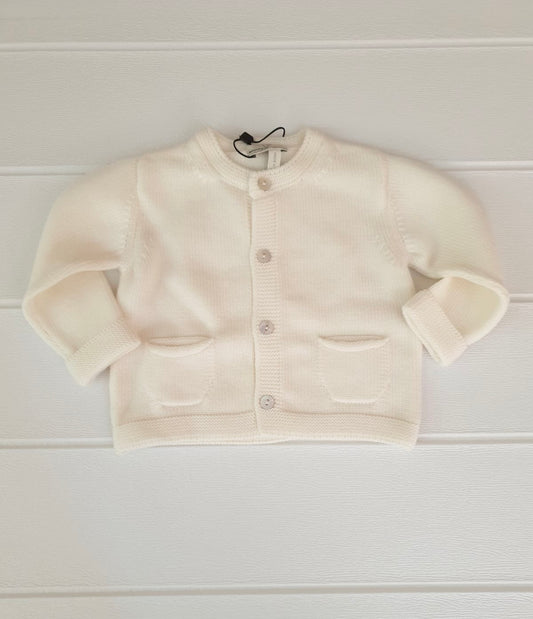 Giacca con tasche in pura lana Merino, nel colore crema.