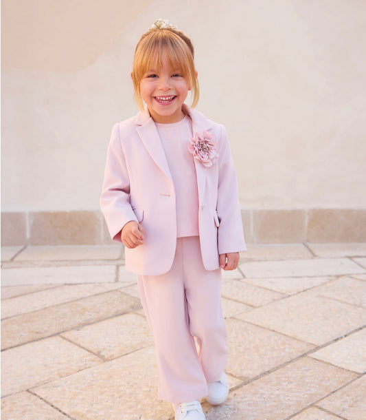 Tailleur bambina nel colore rosa.