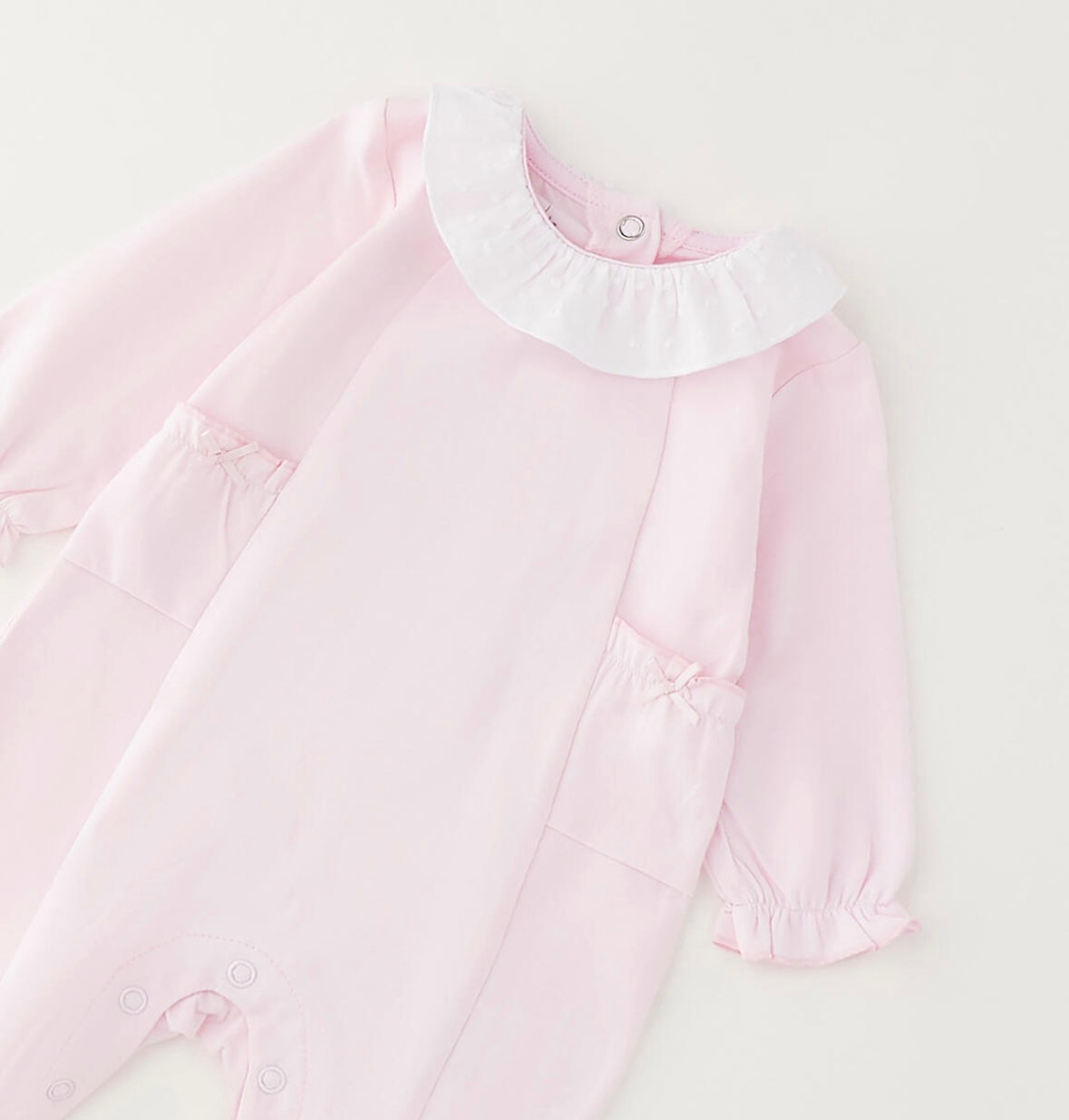 Tutina intera con piede neonata di colore rosa