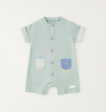 Pagliaccetto da neonato verde con applicazioni davanti