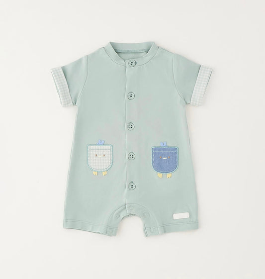 Pagliaccetto da neonato verde con applicazioni davanti