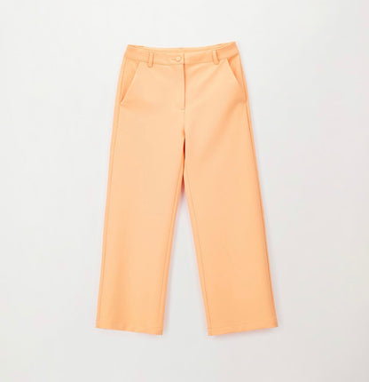 Pantalone elegante da bambina nel colore arancione