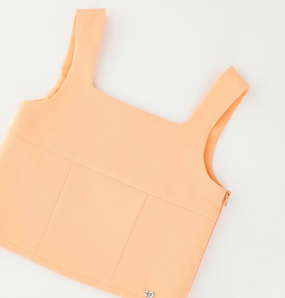 Top bambina nel colore arancione
