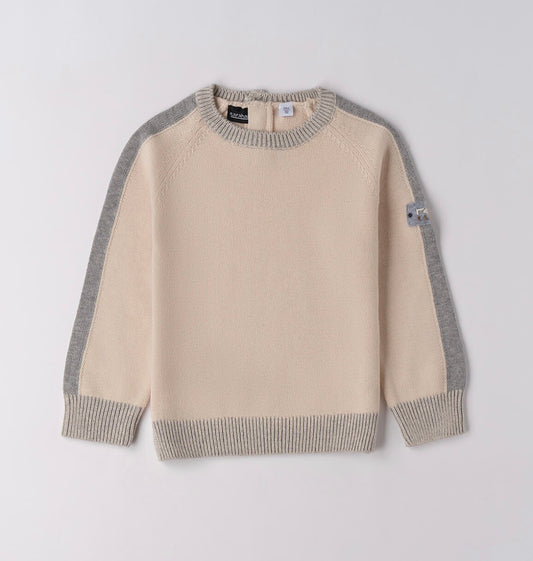 Tricot bambino invernale nel colore ecrù