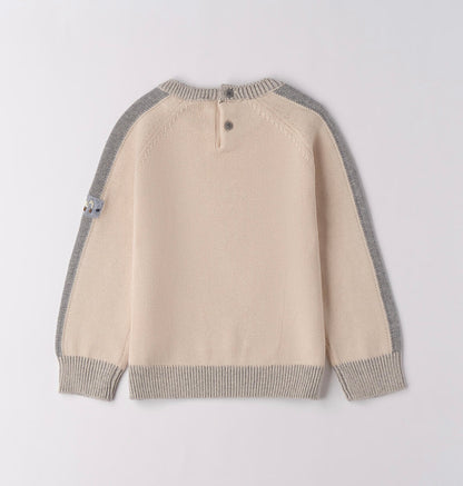 Tricot bambino invernale nel colore ecrù