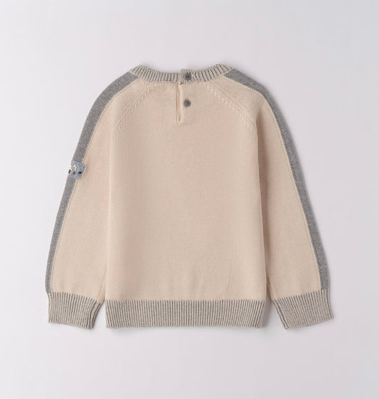 Tricot bambino invernale nel colore ecrù