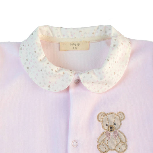 Tutina teddy rosa con colletto e apertura sul davanti