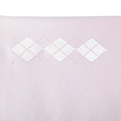 Quadrato in cotone rosa con ricamo rombi bianco