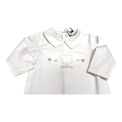 Tutina maniche lunghe con colletto.