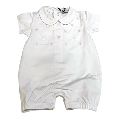Pagliaccetto neonata con colletto , ricamo cuori rosa.