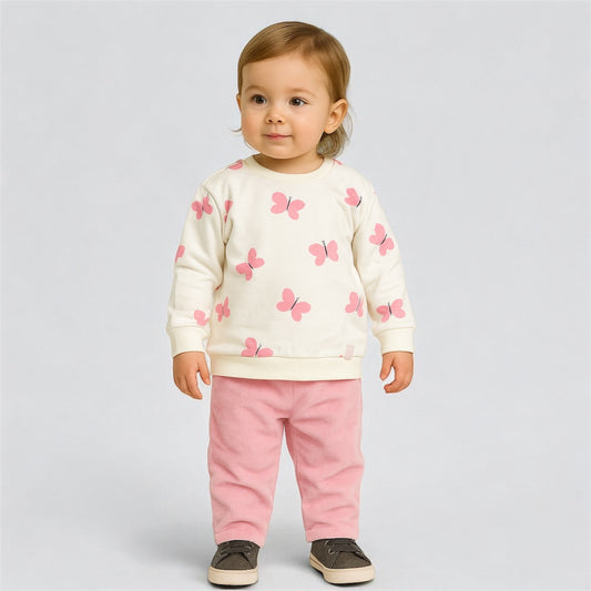 Completo da bambina con felpa bianca a farfalle rosa e pantaloni in velluto rosa.