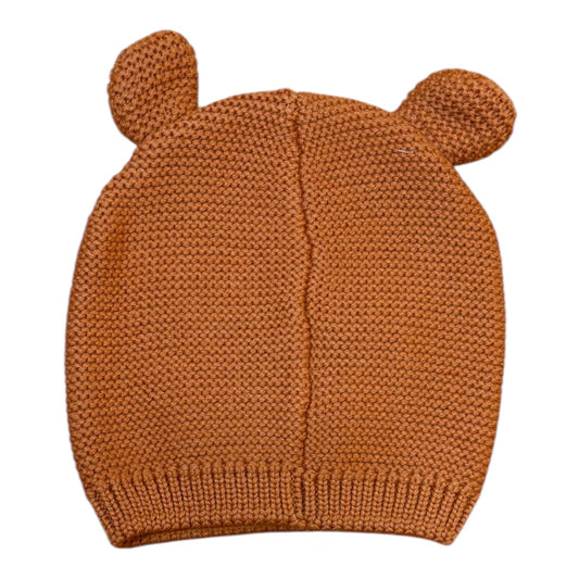 Capellino in lana merino ruggine con orecchie da orsetto.