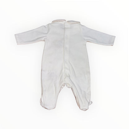 Tutina in ciniglia panna con ricami in contrasto