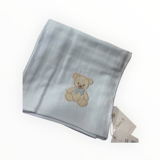 Mussola di cotone celeste con ricamo orso
