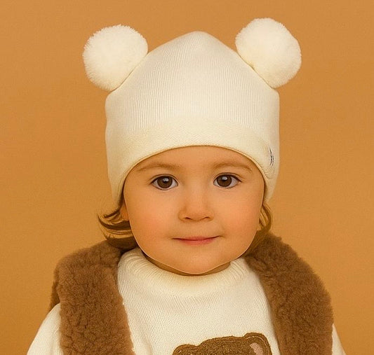 Cappellino pure pompon nel colore ecrù