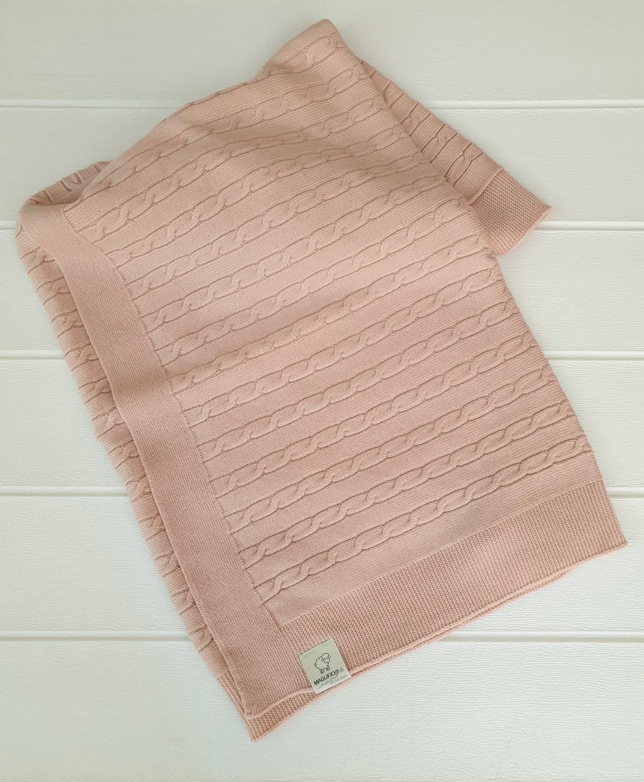 Coperta a trecce in pura lana Merino nel colore rosa